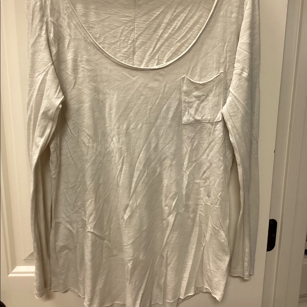Loose fitting pocket tee.